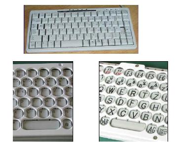 foto van hulpmiddel Klein toetsenbord voor één hand (links of rechts) met 1-vingerbediening